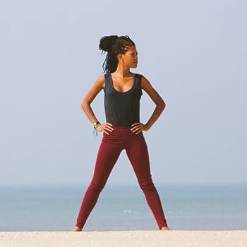 A woman doing Hip Circle Stretch