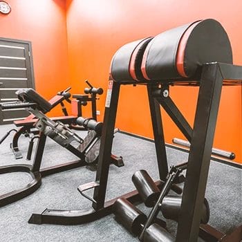 Close up shot of gym equipment in a home gym in a garage